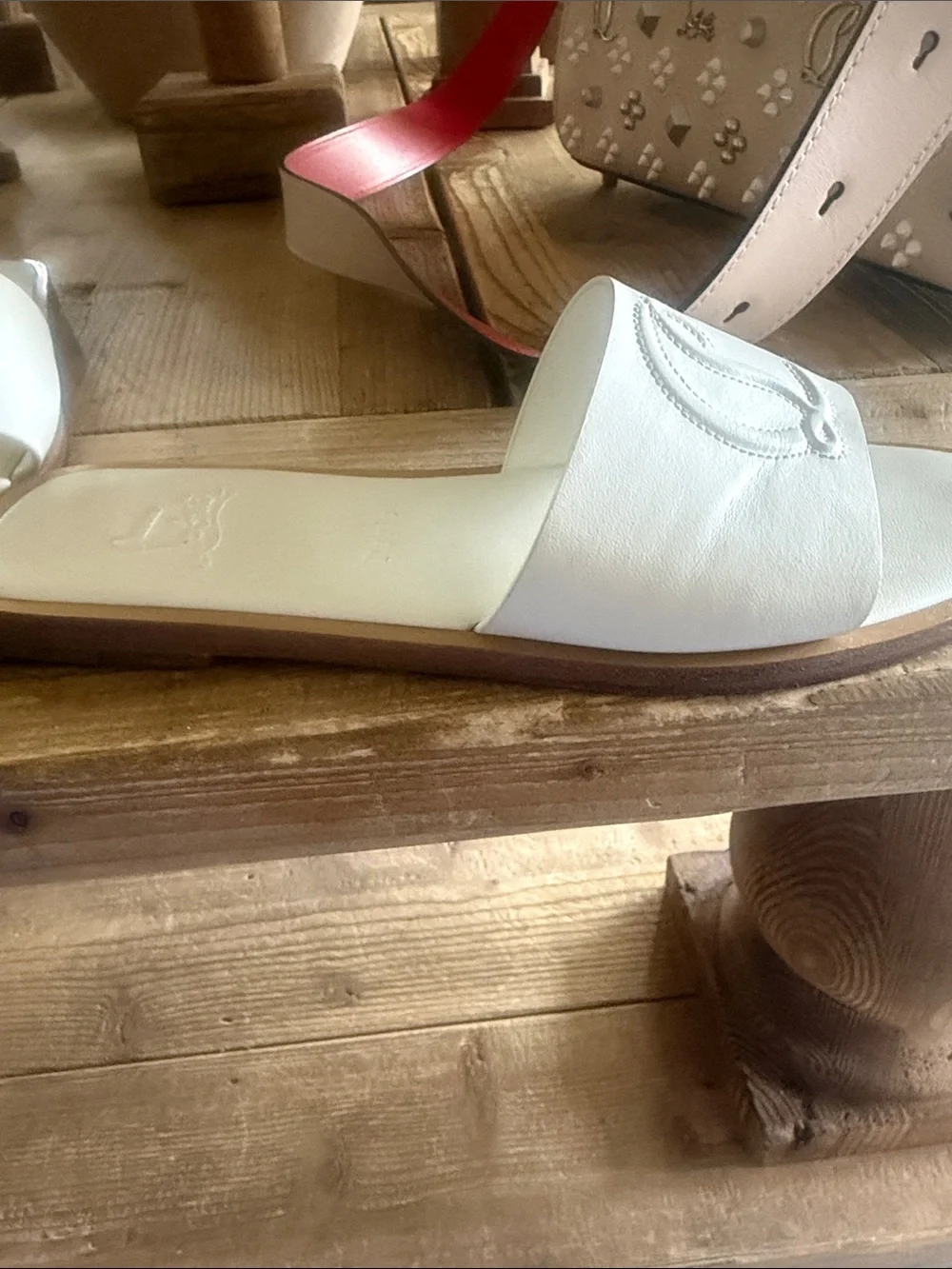 Christian Louboutin sleek white